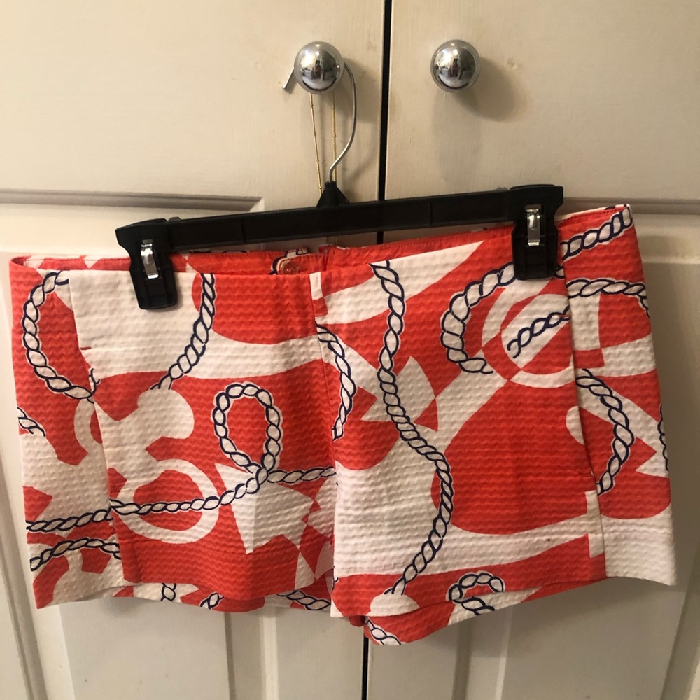 Orange with white anchors, blue nautical rope